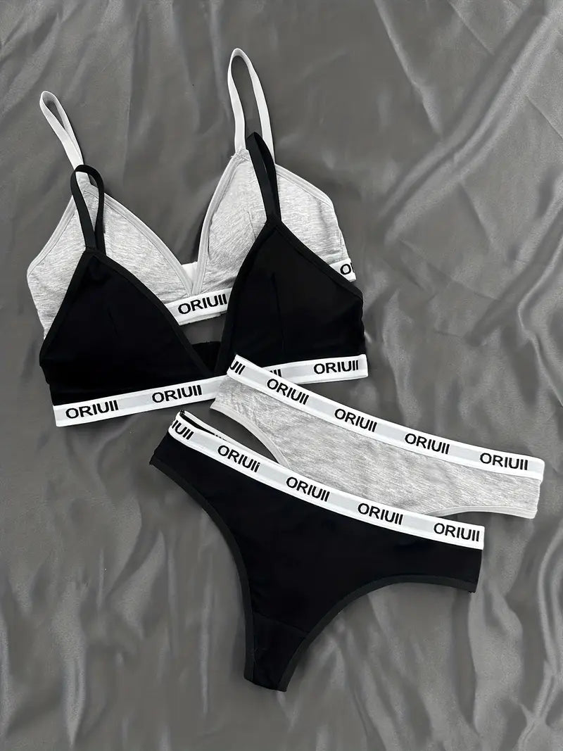 A Set of Two Sports Vests, Two Bras, And Two Thongs.